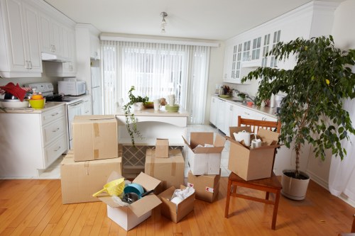 Boxes, bedding, and study items ready for secure student storage